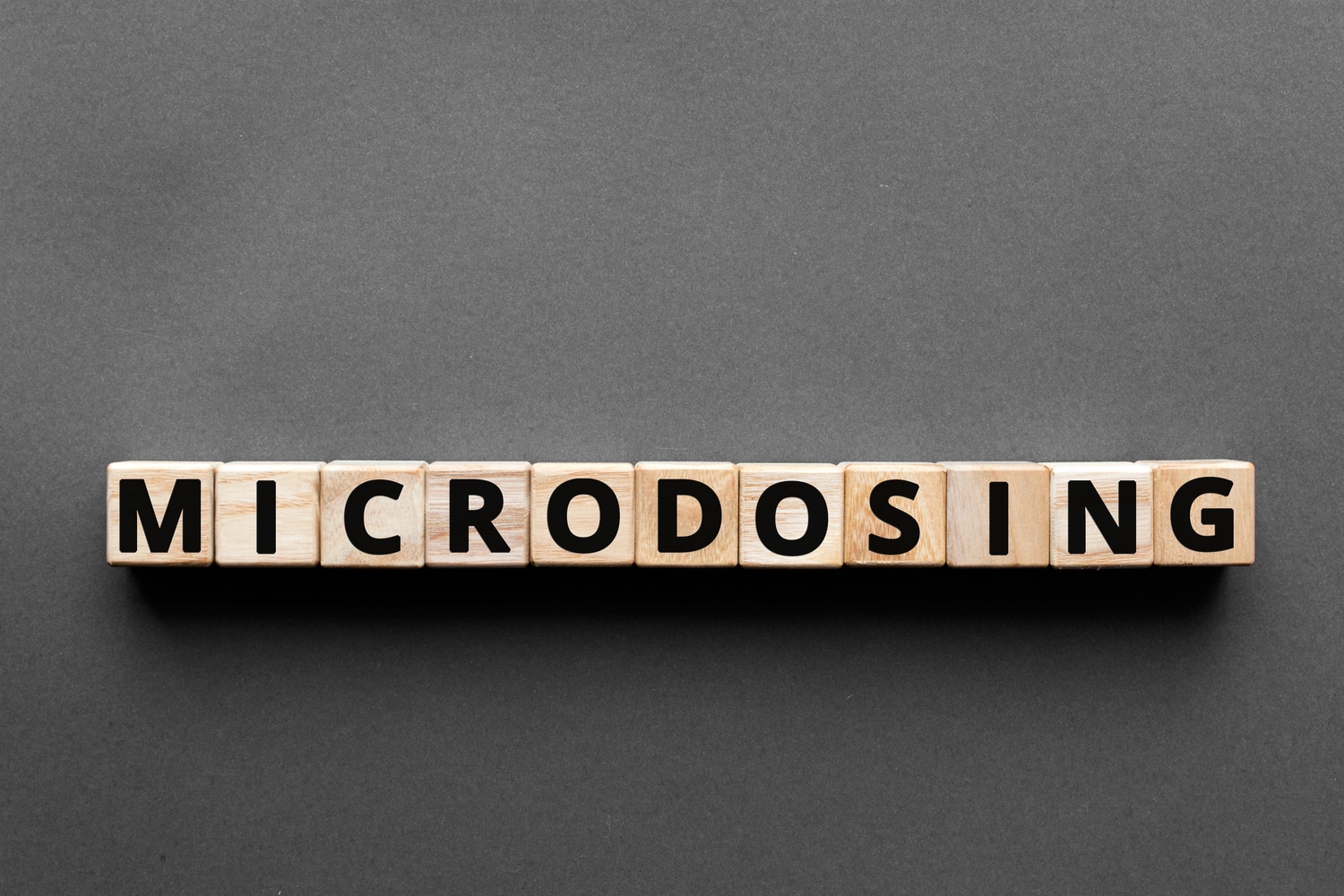 Microdosing spelled out with block letters