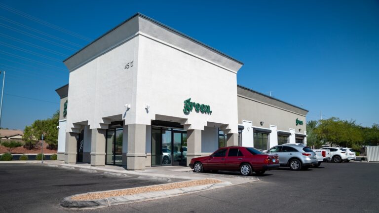 Green-Storefront-home-of-price-match-guarantee
